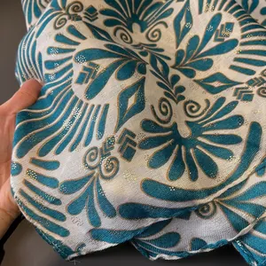 Teal floral cotton linen shawl with gold glitter print and frayed edges for summer sun protection