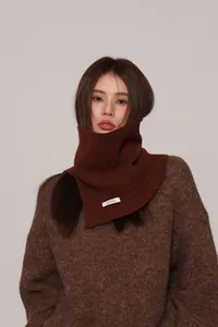 Detail of 100% pure wool rib-knit neck warmer shown in close-up with soft texture