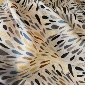 Elegant cotton linen scarf with artistic teardrop prints and metallic glitter details