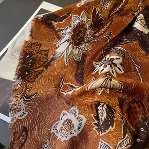 Elegant linen-feel shawl with vintage floral peony pattern and frayed tassel edges