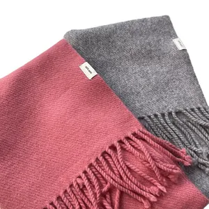 Pink and grey 100% pure wool scarves featuring elegant tassel fringe and woven texture