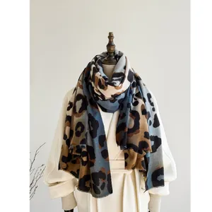 Thick leopard print cashmere shawl scarf for women showing premium knit texture