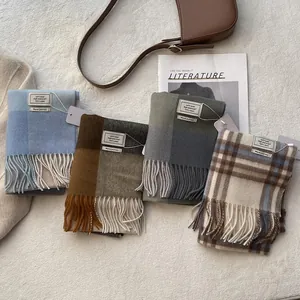 Classic 100% pure wool checkered fringe scarf with warm tones for winter styling