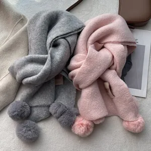 Thick faux cashmere scarf with fur balls in grey and pink for winter warmth