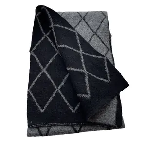 Classic diamond-pattern knit wool scarf featuring double-sided black and grey design