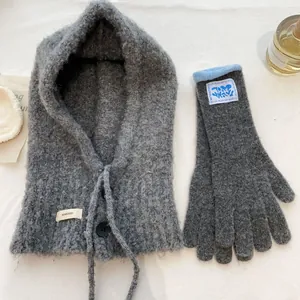 Grey knit balaclava hat and gloves set with soft wool texture and drawstring