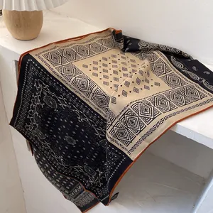 Italian style paisley silk wool scarf with geometric patterns and red contrast stitching