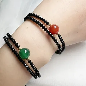 Bracelet double rang en spinelle noir et agate avec pierres centrales rouge et verte