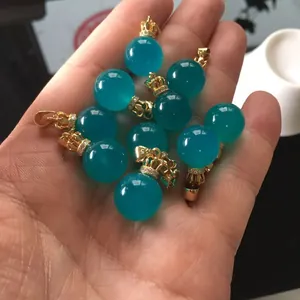 Polished amazonite crystal sphere pendant with S925 sterling silver golden crown detail