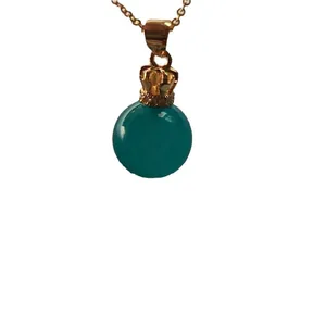 Amazonite gemstone pendant with a gold crown setting and a matching fine gold chain