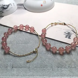Pink strawberry quartz beaded bracelets with gold plated 14K accents and adjustable clasp