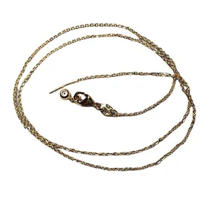 Collier en argent 925 doré avec fermoir mousqueton et détail de breloque œil bleu