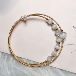 Double-layer 14K gold plated coil bracelet with grey cat eye beads and white pearls