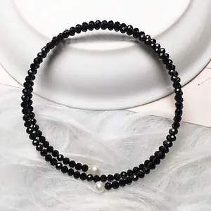 Double-layered 3mm faceted black spinel beaded bracelet with white pearl end accents