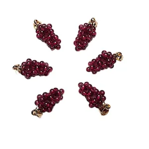 Handmade garnet grape pendant with 14K gold filled clasp in a circular layout