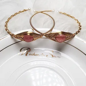 Handmade 14K gold wire wrapped strawberry quartz evil eye bracelet with pearl accents