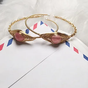 Handmade strawberry quartz evil eye cuff bracelets with 14K gold wire wrap and pearls