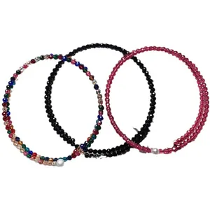 Three colors of double-layer faceted spinel bracelets with pearl accents on white background