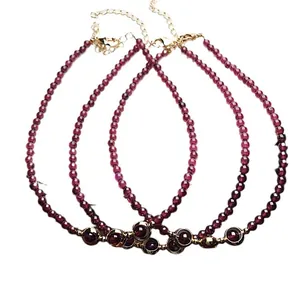 Garnet beaded necklace with 14K gold plated accents and adjustable lobster clasp