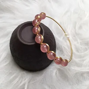 Pink strawberry quartz beaded bracelet with 14K gold wire wrap and small pearls