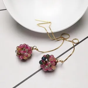 Long gold chain drop earrings with colorful tourmaline crystal bead clusters detail