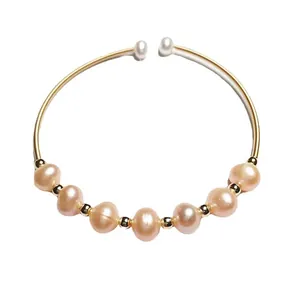 Handmade 14K gold filled wire wrapped open bangle with pink freshwater pearls