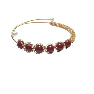 Handcrafted 14K gold plated wire bracelet with red cinnabar beads and white pearls