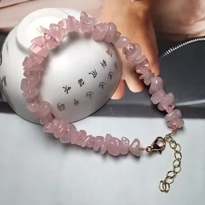 Natural rose quartz crystal chip bracelet with golden lobster clasp and adjustable chain
