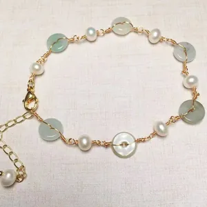 Detail of freshwater pearl bracelet with jade donuts and adjustable 14K gold-filled clasp
