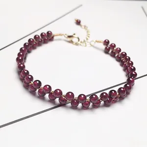 Dark red garnet bead bracelet with 14K gold filled wire weaving and lobster clasp