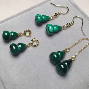 Macro view of malachite gourd earrings in hook, hoop, and long chain drop styles