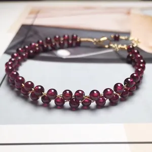 Double-layered garnet bead bracelet with 14K gold-filled wire and adjustable lobster clasp