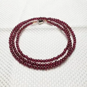 Three-layer garnet wrap bracelet with 3-4mm deep red gemstone beads and silver clasp