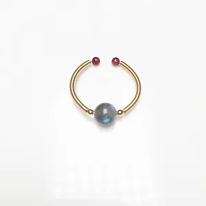 Handmade 14K gold wire wrapped ring featuring Labradorite crystal and purple accent beads