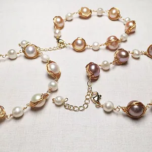 Handmade freshwater pearl bracelet with 14K gold filled wire wrap and adjustable lobster clasp