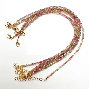 Detailed view of 2.4mm colorful tourmaline bead anklets with gold lobster clasps and chains