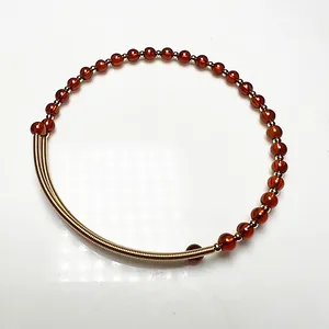 14K gold wire hand-wrapped beaded bracelet featuring Garnet and Labradorite gemstones