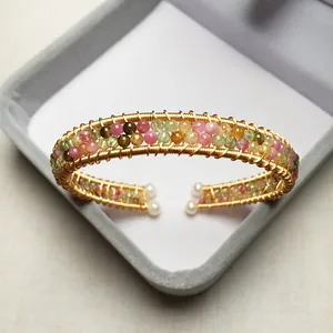 Detail of handmade 14K gold filled tourmaline beaded bangle with pearl accents