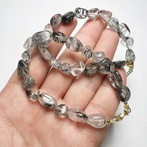 Natural black rutilated quartz bead bracelet with 14K gold-plated adjustable clasp