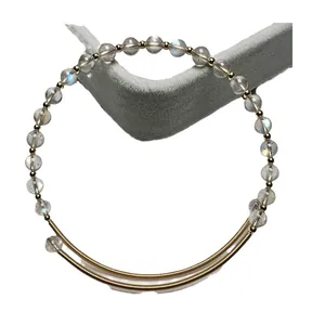 14K gold filled wire wrapped crystal bracelet featuring garnet and labradorite faceted beads