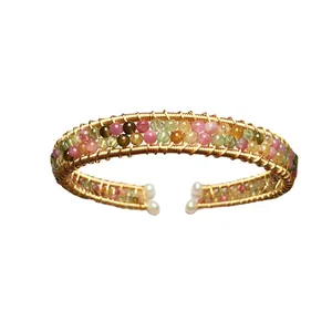 Handcrafted 14K gold filled tourmaline wire wrap bangle with elegant freshwater pearl accents