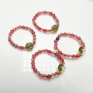Garnet and tourmaline beaded ring set with 14K gold-plated coin charm details