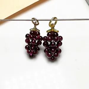 Exquisite handmade grape pendant with purple garnet beads and gold metal leaf decoration