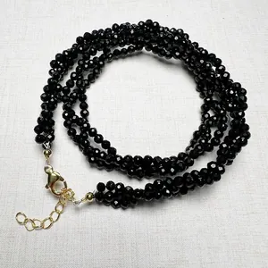 Choker necklace featuring 3mm black faceted spinel beads with adjustable gold clasp