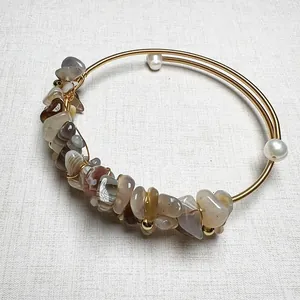 Bohemian wire-wrapped gold bracelet with natural crystal gravel and white pearls