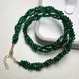 Elegant emerald green spinel choker with faceted multi-layer beads and gold clasp