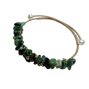 Gold-plated wire open bangle featuring natural green crushed stones and pearl accents