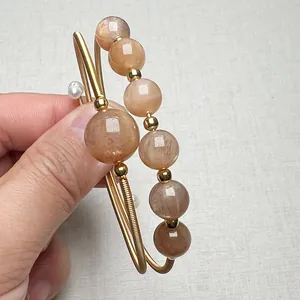 Handcrafted 14K gold-plated sunstone beaded wrap bracelet with unique wire-wound design