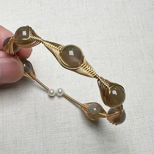 Handmade 14K gold wire wrapped bracelet with brown sunstone beads and pearls