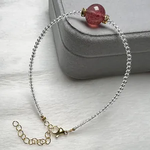 Handmade strawberry crystal and white spinel beaded bracelet with gold lobster clasp